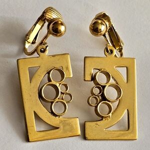 Vintage earrings clip on gold tone machine age industrial style